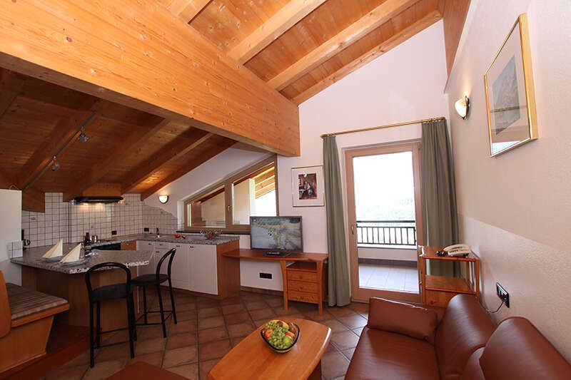 Apartment with living area and balcony at the Seaper Ranch in Tyrol